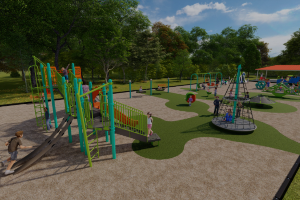 Wide view of the modern, colorful playground equipment and green spaces at Miller Park in Ohio.