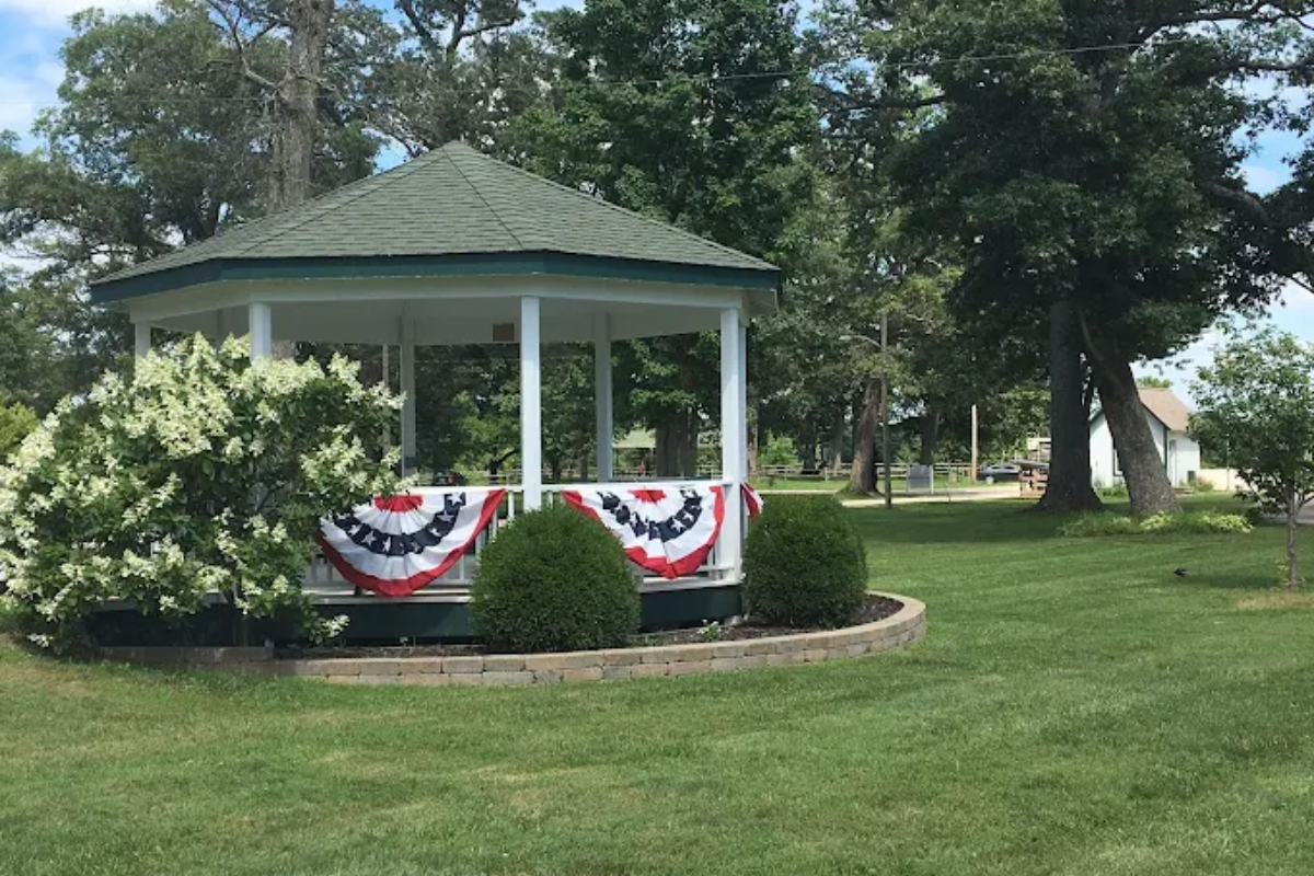 White gazebo with patriotic bunting at Pastime Park in Plain City.