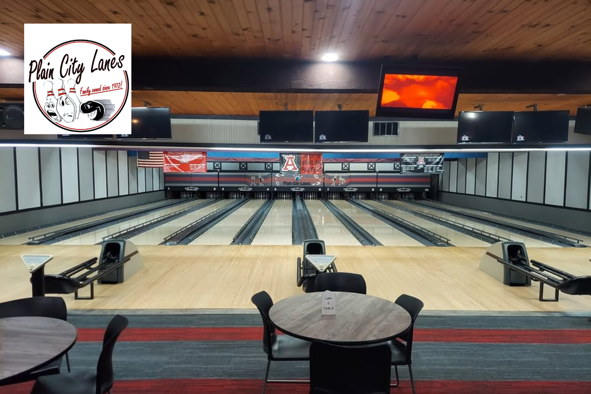 Interior view of the bowling lanes at Plain City Lanes with a seating area in the foreground.